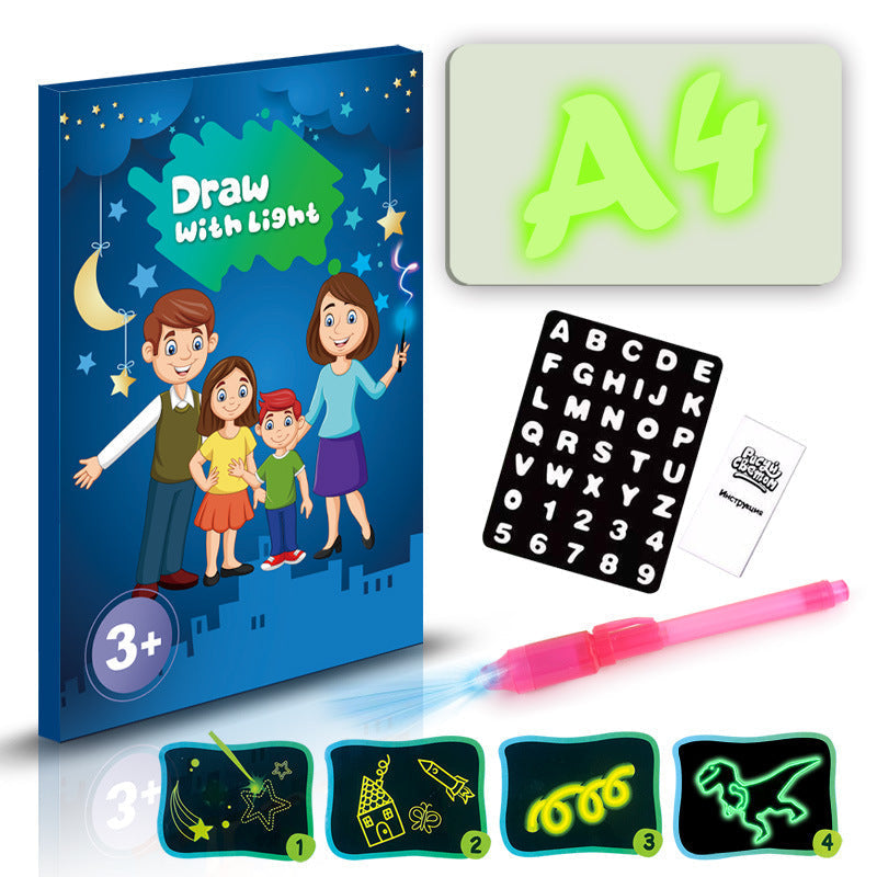 3D Magic Light-Up Drawing Pad with a blue starry box, glowing green A4 board, letter stencil, and pink light pen