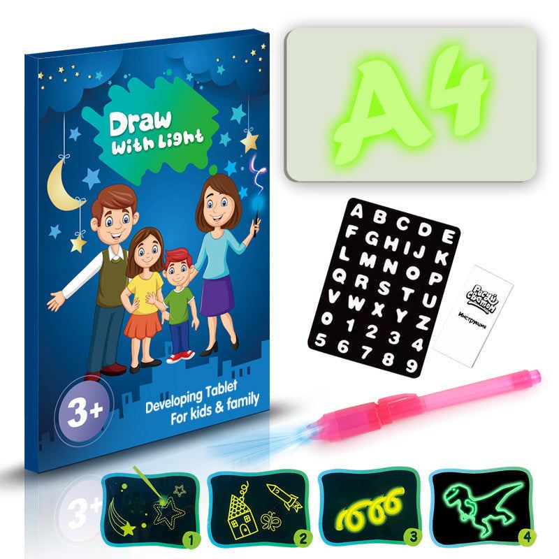 3D Magic Light-Up Drawing Pad with a blue illustrated box, glowing green A4 board, alphabet stencil and pink light pen