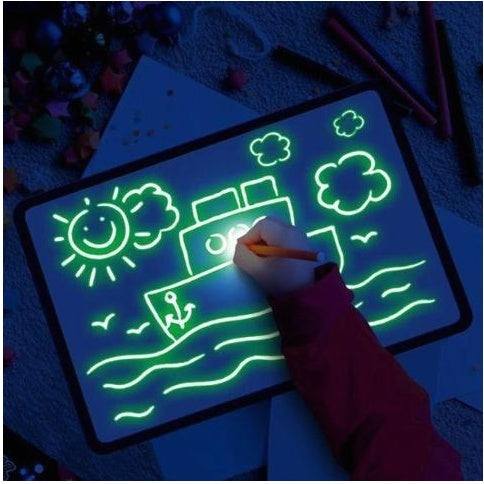 3D Magic Light-Up Drawing Pad with a black plastic frame and glowing green and blue drawings, used with a light pen