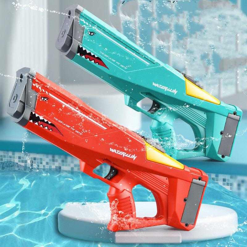 Electric Shark Water Gun pair in turquoise and red plastic, with shark teeth graphics, yellow accents and trigger grips