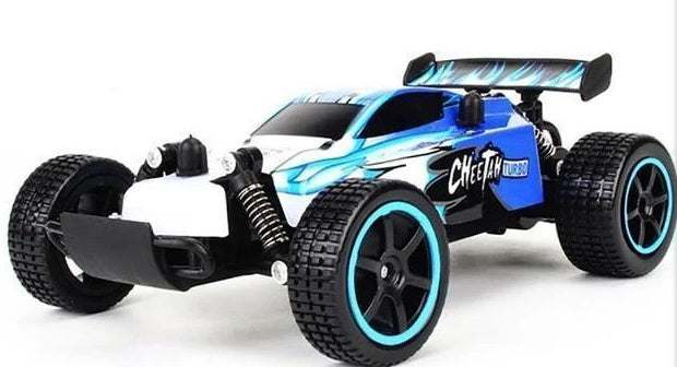 High-Speed RC Off-Road Drift Car in blue, white and black with chunky tires, cyan wheel accents and rear spoiler