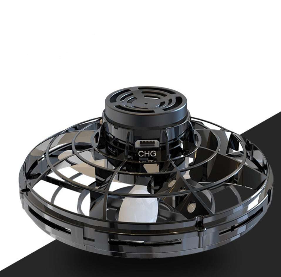 LED Fingertip Gyro Spinner Toy in glossy black plastic with a circular protective cage and raised central charging hub