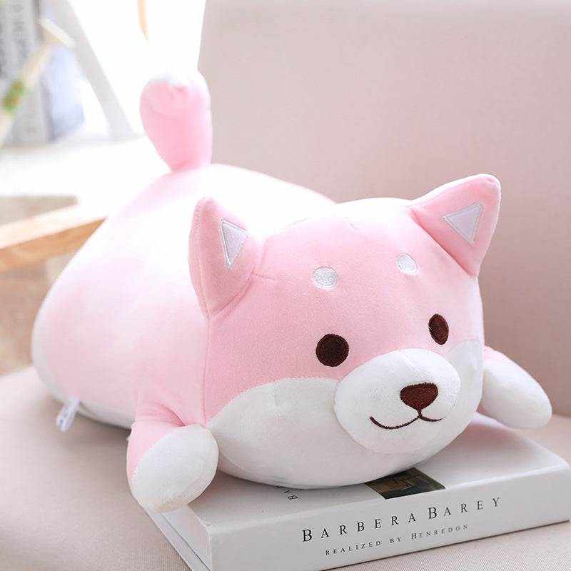 Shiba Inu Plush Toy in soft pink plush with a white muzzle, embroidered face, pointed ears, and a curled tail