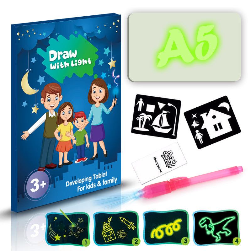 3D Magic Light-Up Drawing Pad with green glowing letters, plastic board, light pen and reusable stencil cards