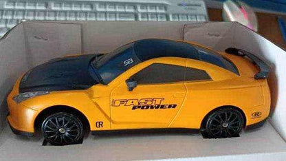4WD RC Drift Car in orange and black plastic with racing decals, dark windows and black multi-spoke wheels
