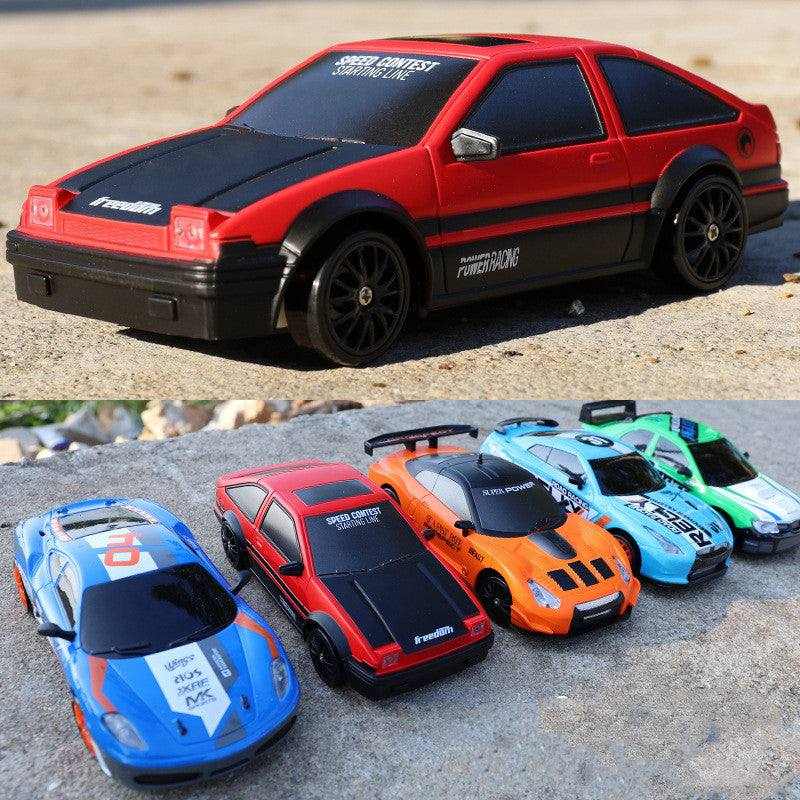 4WD RC Drift Car in red with black trim and wheels, shown among blue, orange and green racing cars