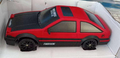 4WD RC Drift Car in red and black with a sporty hatchback body, dark windows, racing stripes and black wheels