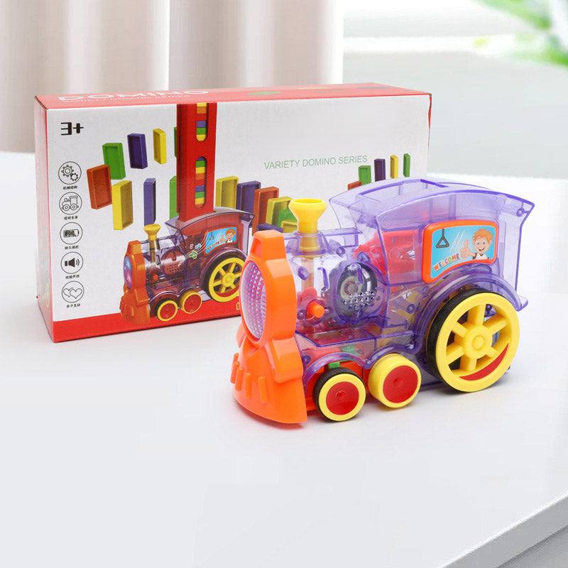 Automatic Domino Train Toy in translucent purple plastic with an orange front, yellow wheels, and colorful domino pieces