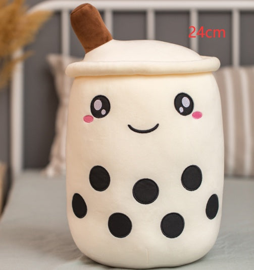 Bubble Tea Plush Pillow in a cream cup shape with brown straw, black tapioca pearls, and embroidered smiling face