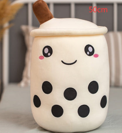 Bubble Tea Plush Pillow with a cream cup, white lid, brown straw, smiling face and black boba dots