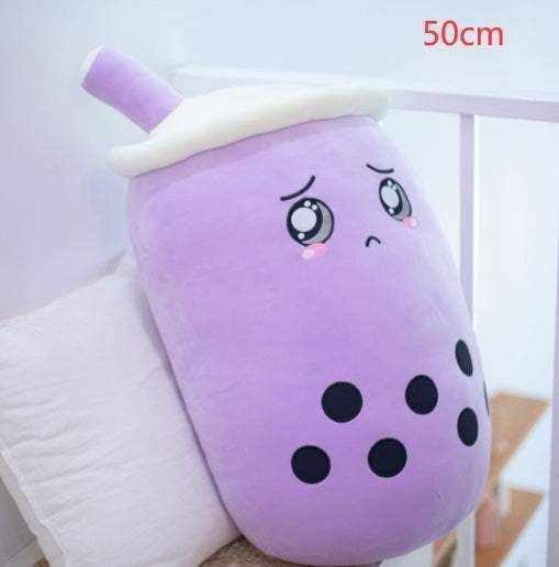 Bubble Tea Plush Pillow in lavender short plush with a white whipped topping, straw, embroidered eyes and black tapioca pearls
