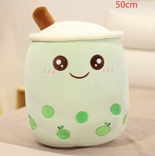 Bubble Tea Plush Pillow in pale mint plush with green tapioca pearls, embroidered smiling face, white lid and brown straw