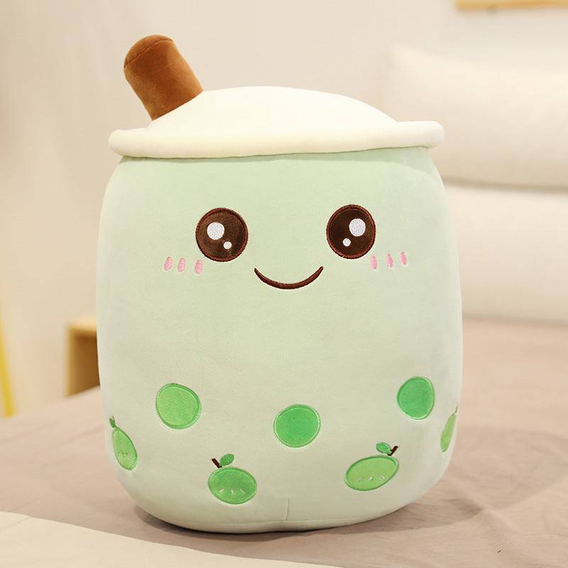 Bubble Tea Plush Pillow in pale mint green short plush with a white whipped cream top, brown straw and embroidered face