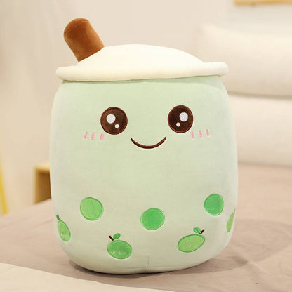 Bubble Tea Plush Pillow in pale mint green short plush with a white whipped cream top, brown straw and embroidered face