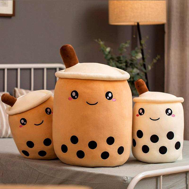 Bubble Tea Plush Pillow set in orange and cream plush fabric, with embroidered smiling faces, dark tapioca dots and straw details