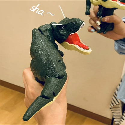 Dinosaur Spring Fidget Toy in dark green textured plastic, with an open red mouth, cream teeth and a long tail