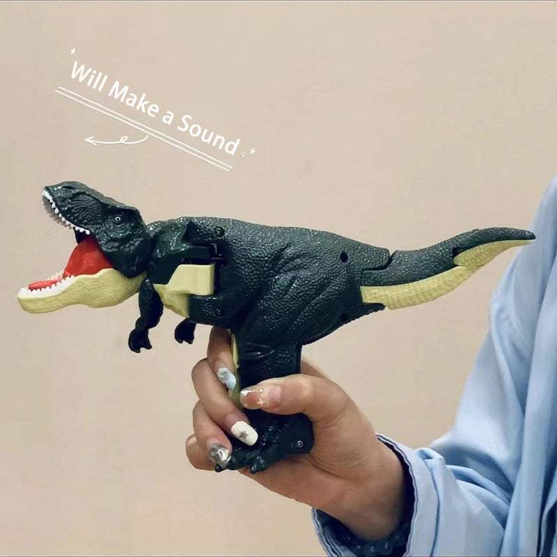 Dinosaur Spring Fidget Toy with a textured dark green plastic body, open red mouth, cream details and long tail