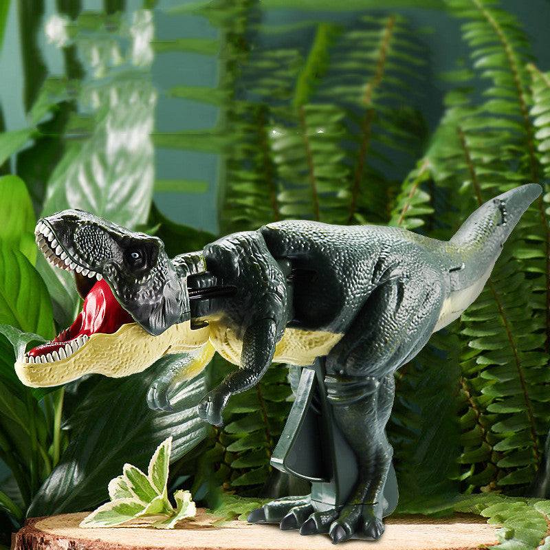 Dinosaur Spring Fidget Toy with a dark green plastic T-rex, cream underside, open red mouth and visible black spring