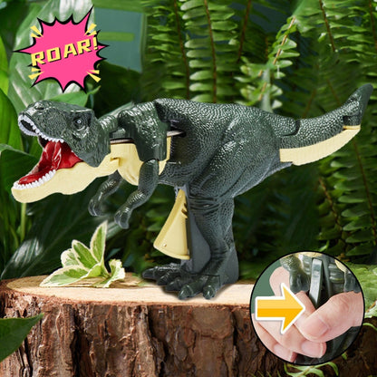 Dinosaur Spring Fidget Toy with a dark green textured dinosaur, open red mouth, cream accents and a push mechanism