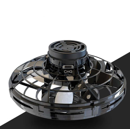 LED Fingertip Gyro Spinner Toy in glossy black plastic with a circular protective cage and raised central charging hub