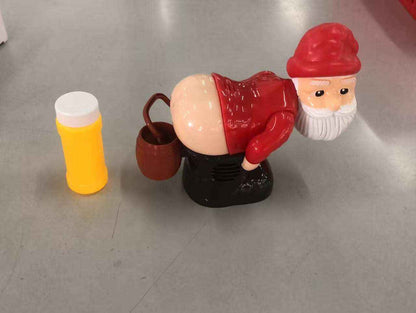 Santa Claus Bubble Machine Toy in glossy red, white, peach and black plastic, with a red hat and molded beard.
