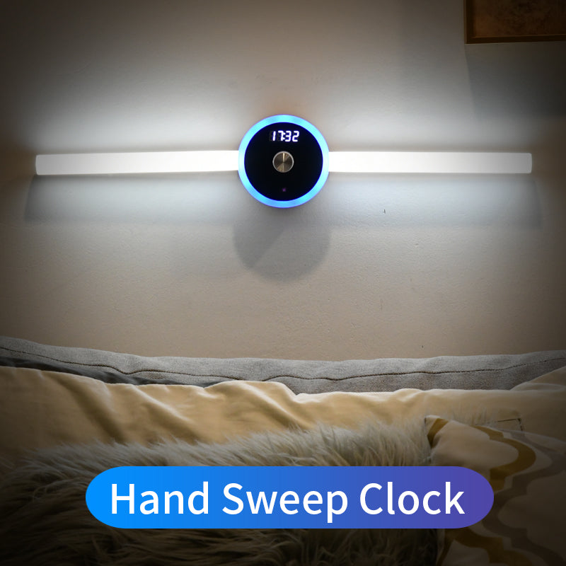 Smart LED Cabinet Light with a slim white bar, circular blue-lit digital clock display and central sensor.