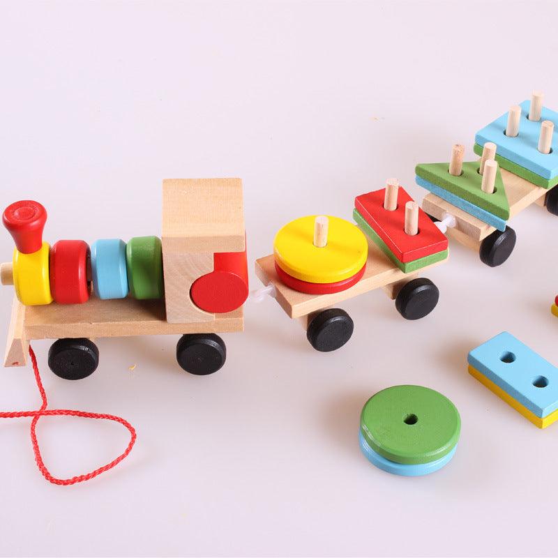 Wooden Train Tractor Puzzle Toy with a natural wood locomotive and wheeled carriages, colorful stacking rings and shape blocks